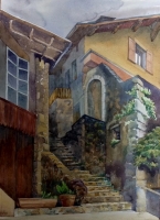 Dorpsgezicht met trapopgang naar bovenliggende huizen